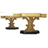 Italian carved and faux marble pair of consoles