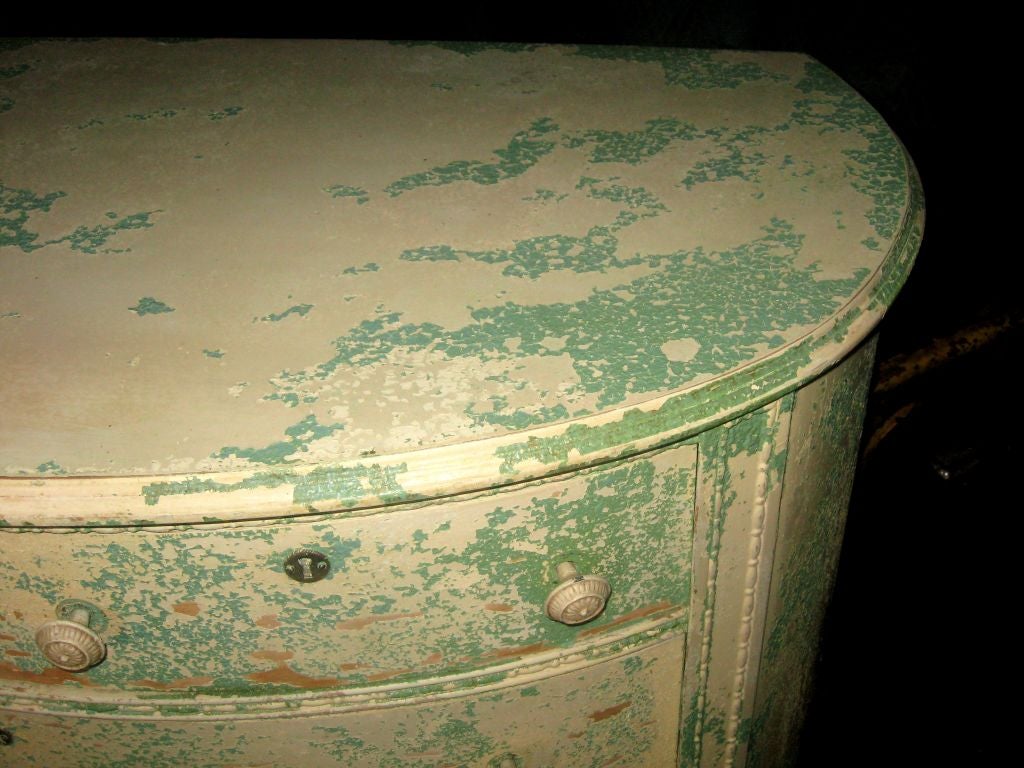 19th Century Charming turn of the century oval chest of drawers