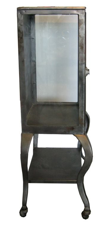 A great medical cabinet with beautiful age marks and sexy curvy legs. It can have inside up to three shelves. Perfect for a bathroom or as a bar