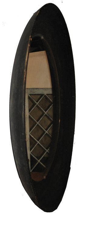 Very large pan shaped industrial mirror