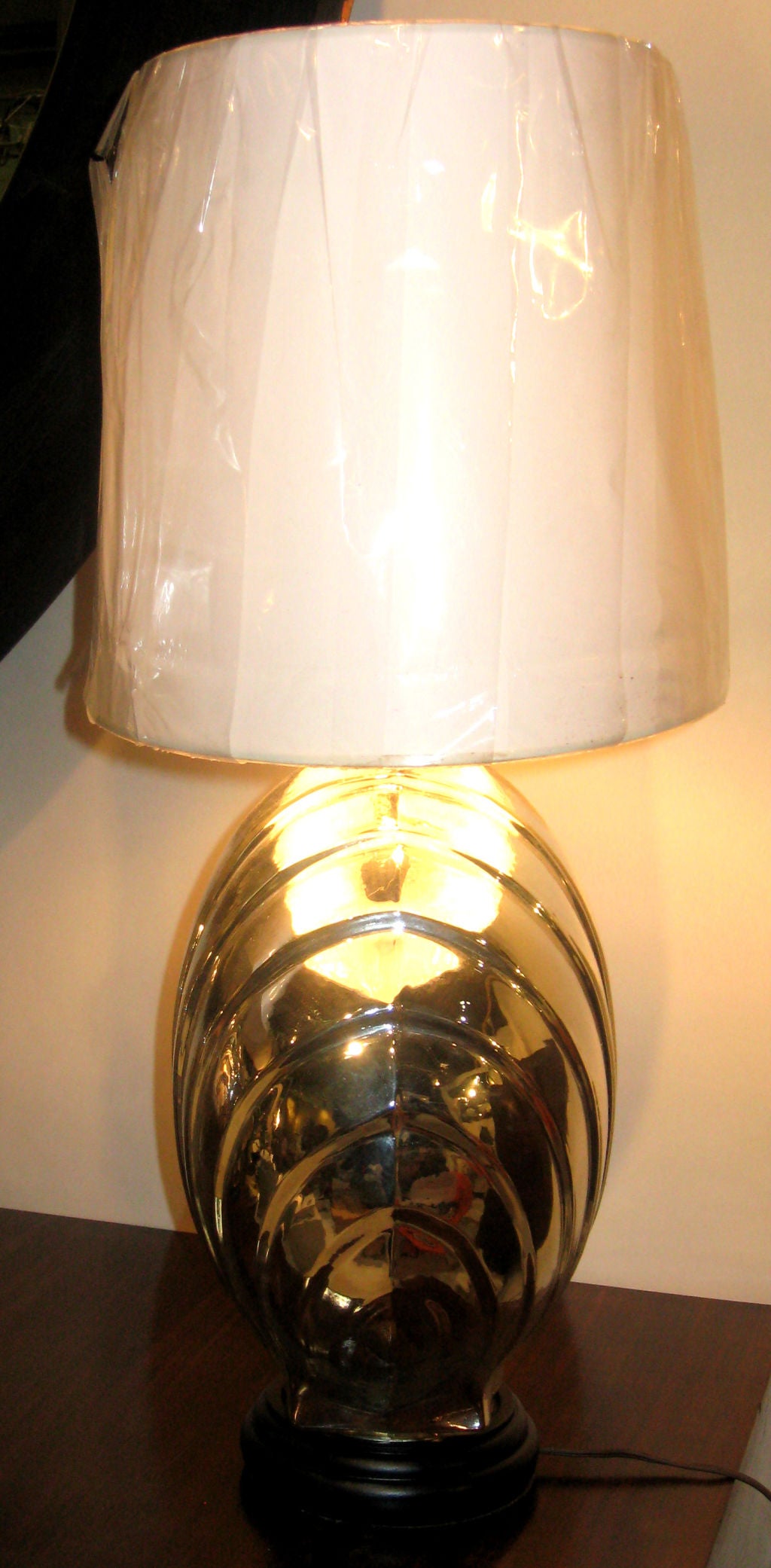 Pair of shell shaped mercury glass lamps
