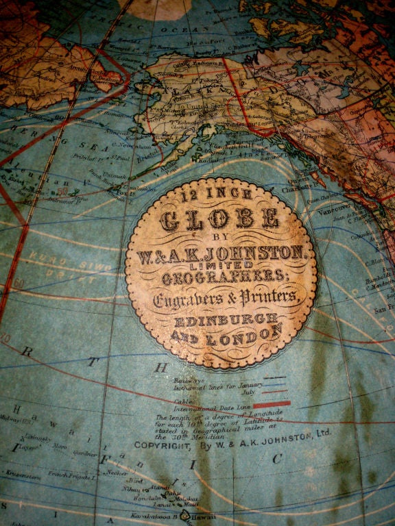 Turn of the century British globe on a copper stand