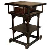 Antique industrial stand on wheels