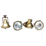 Four beautiful brass industrial lamps