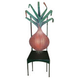 A set of 8 hand painted iron " vegetable" chairs by Villiers