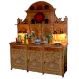 Antique Heavily carved  and decorated wooden sideboard.