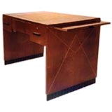 A Dim Mahogany Desk