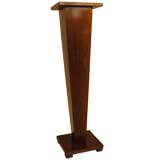 A MAHOGANY CUBIST PEDESTAL