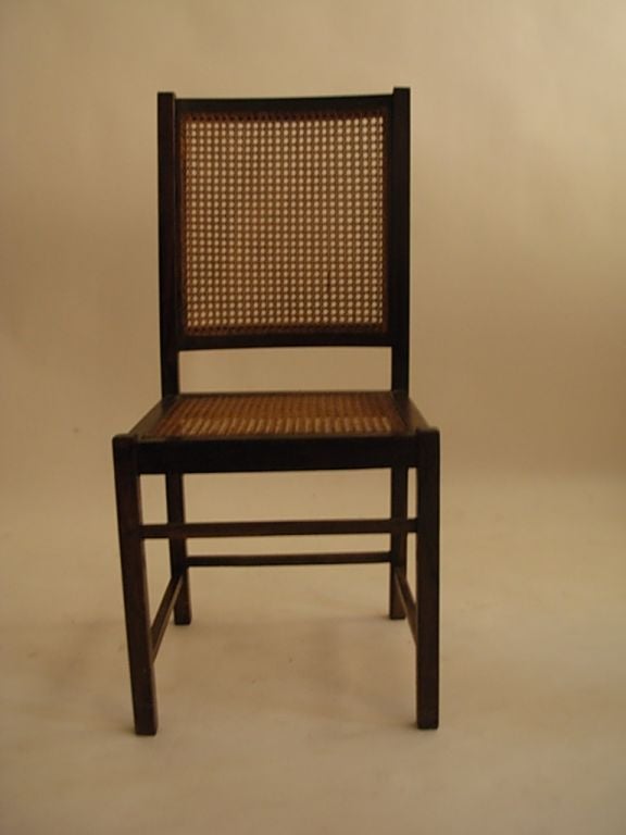 Jacaranda (rosewood) frame with hand caning on back & seat.<br />
DIMENSIONS: 16 ½ in. wide X 17 ½ deep X 37 in high. <br />
Seat: 16 in wide X 16 ½ deep X 16 ½ in high.