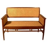 An Oak Bench with Cane Seat