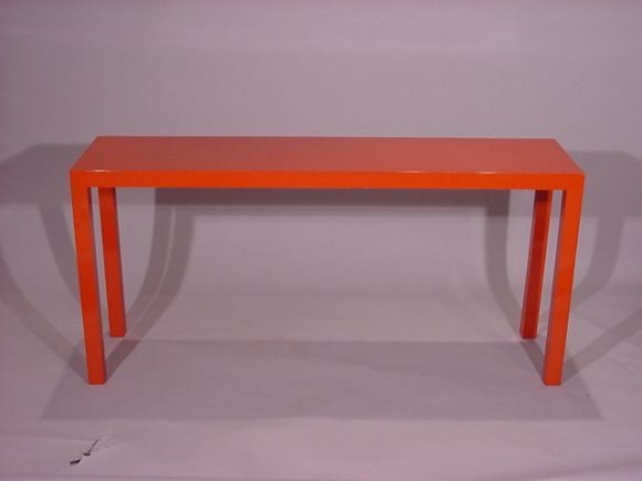 A Red Lacquered Console Table