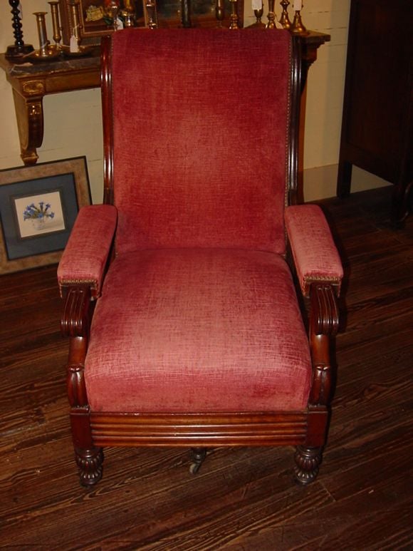 Excpetionally nice French Louis-Philippe period gentleman's library chair with reclining back and retractable foot stool, circa 1840