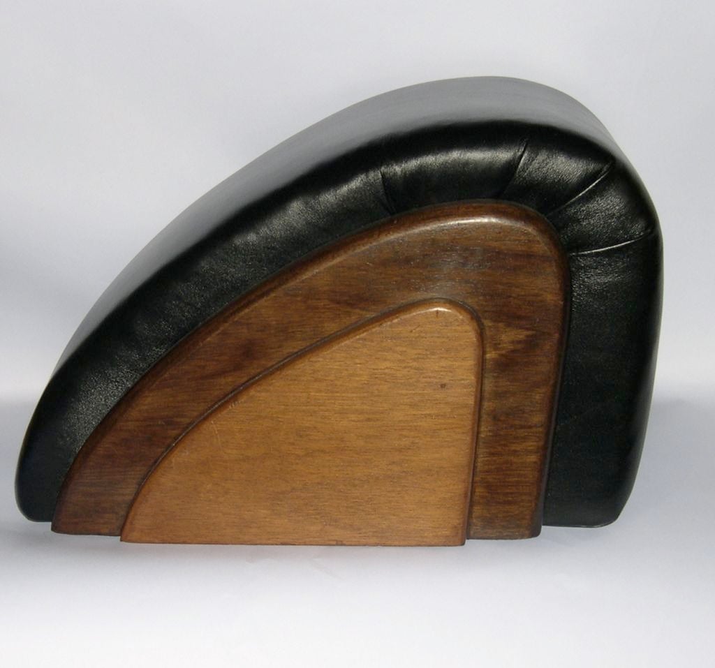 In the lower level of the famous Bullocks Wilshire Dept.Store, Jock Peters designed the Women's Slipper Dept. in a very curving, streamline style similar in feel but not color to the Women's Shoe Department upstairs. The design of this ottoman not