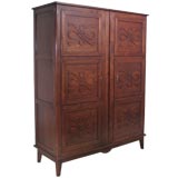 Armoire with Stylized Ribbon Panel Decoration