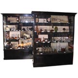 A Pair of Ebonized Display Cabinets