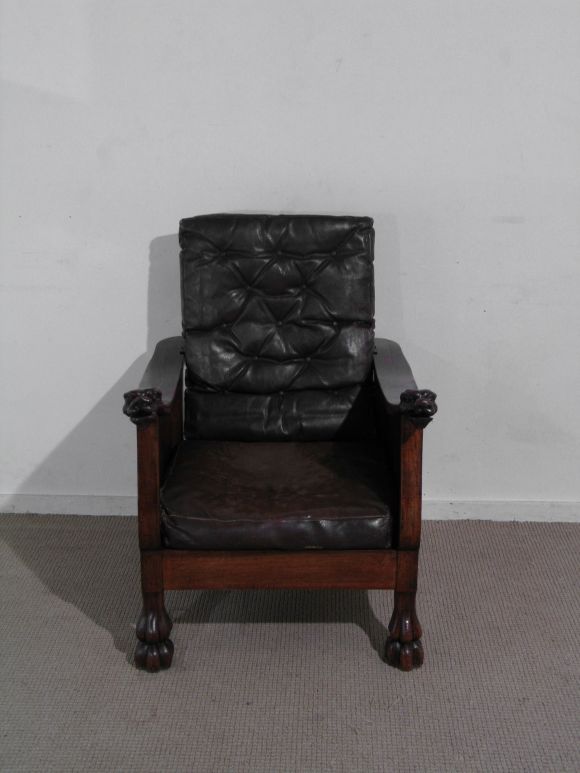 A Walnut and Pine Morris Chair with <br />
Arms Terminating in Carved Lions Heads and Paw Feet. French, Early 20th Century