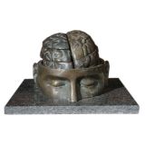 A Surreal Brass Sculpture of a Head and Brain on a Stone Base