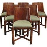 set of six dining chairs by Charles Dudouyt