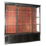 A Large Ebonized Display Cabinet
