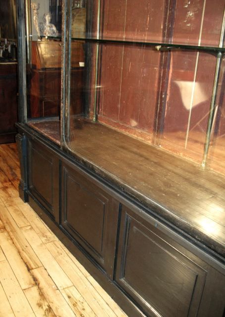 A Large Ebonized Display Cabinet
