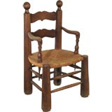 An Overscale Oak and Rush Fauteuil