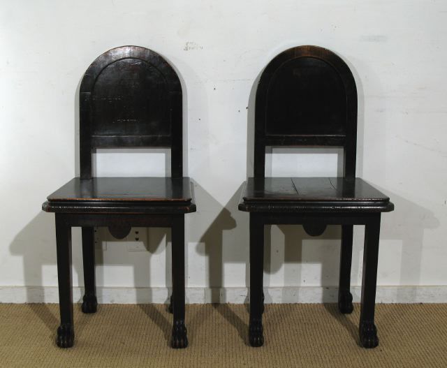 A Pair of Ebonized Mahagony Hall Chairs with Paw Feet  in Egyptian<br />
Revival Style. Italian , Circa 1870's