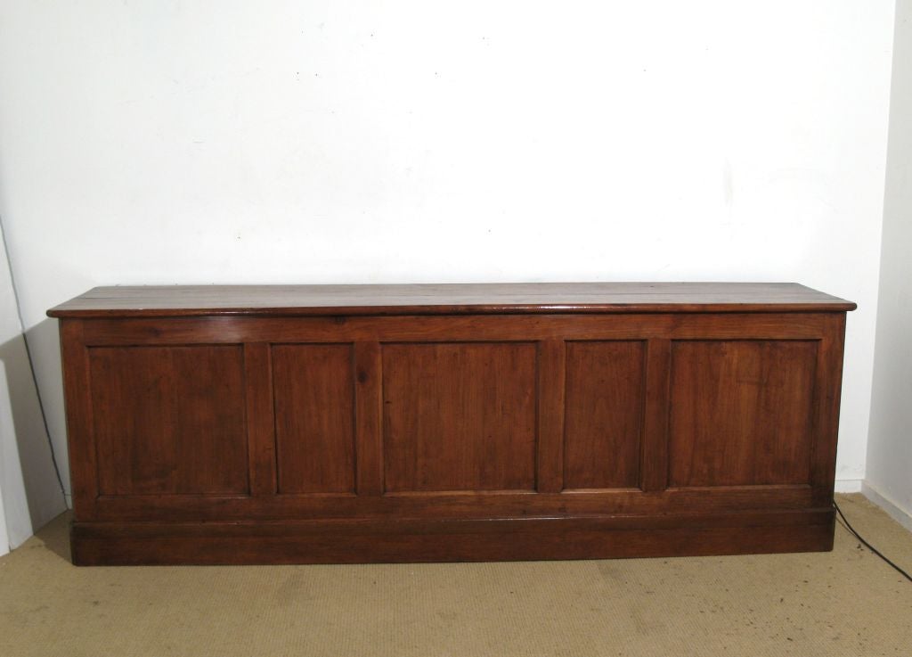 A Shop Counter with Fielded Panels in Cherry. Base Restored, French,<br />
Mid 19th Century