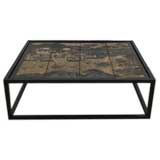 A Metal Coffee Table made from  Four Panel Coromandel Screen