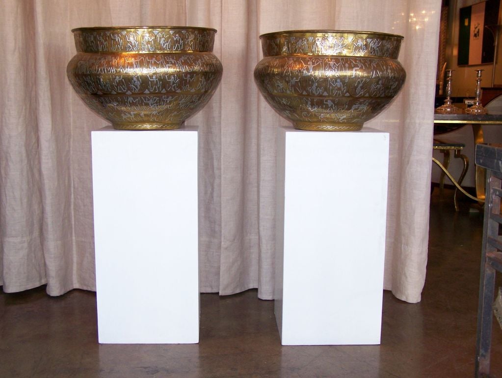 Pair of Egyptian brass planters with figural designs in copper and white metal.