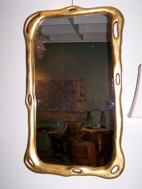 BEAUTIFUL GOLD LEAF HAND CARVED WOOD MIRROR.