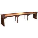 Curved walnut banquette