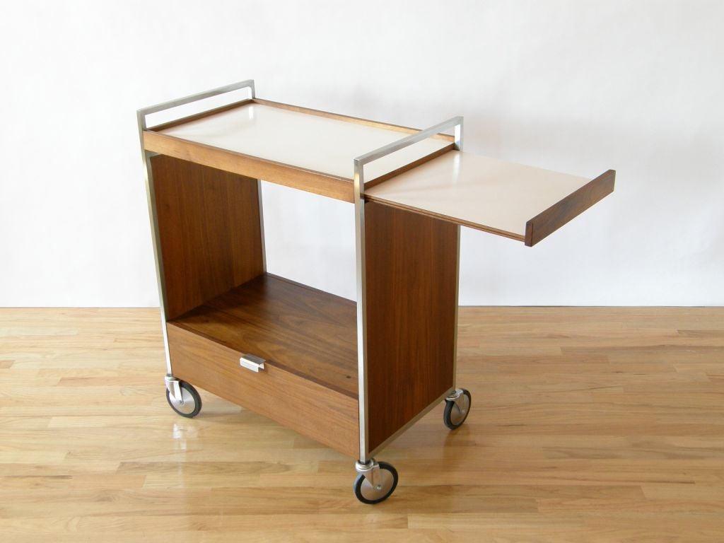 Walnut cart designed by George Nelson for Herman Miller. A good piece for serving or as a T.V. stand.