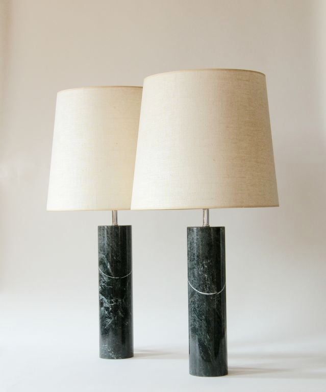 Nice pair of deep green marble column lamps by Nessen.