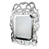 A Venetian Glass Mirror of Unusual Form