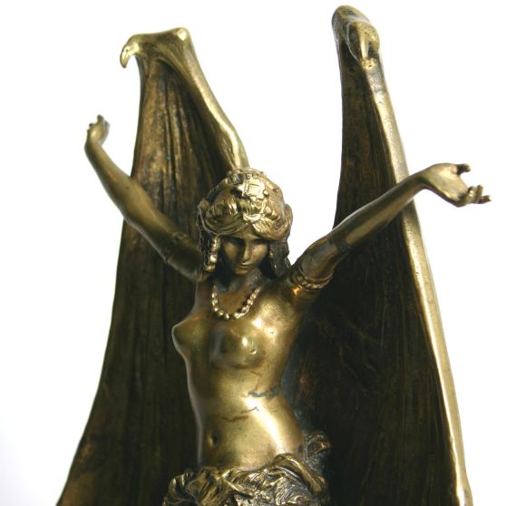 This is a fabulous, sexy bronze.  She has a beautiful face and the details are excellent.