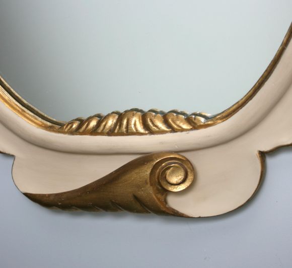 A very fine example of Dorothy Draper's style in this shell mirror in cream and gold.