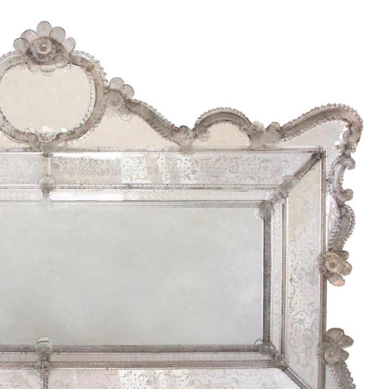 This is an early and unusual horizontal Venetian mirror. The quality is very good.