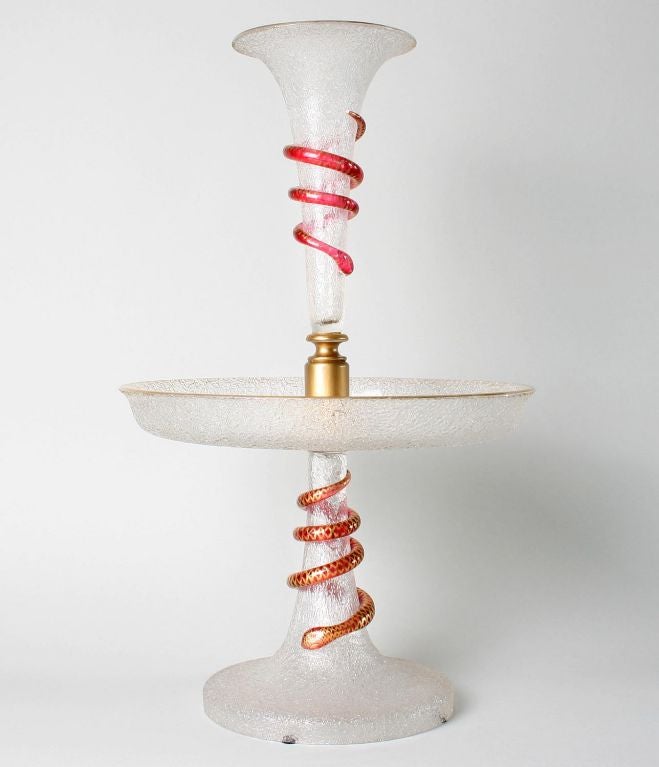 Beautifully executed, this centerpiece epergne boasts a deep pink/red coiled serpent motif with accents of gold.