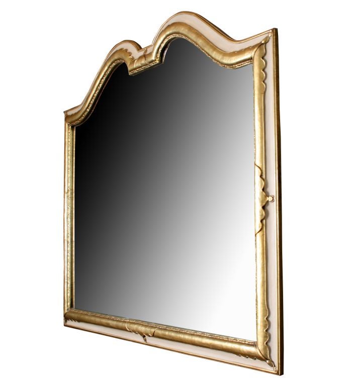 This is a beautifully done mirror, subtly carved.