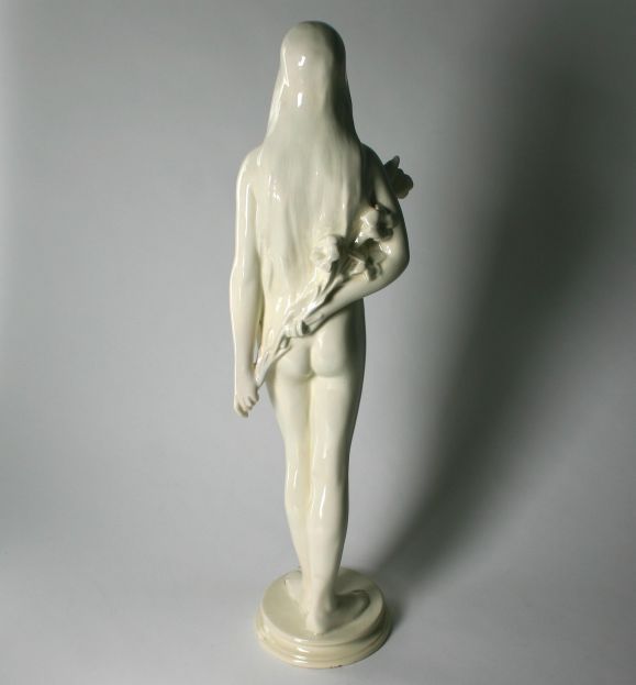 This is a graceful porcelain nude