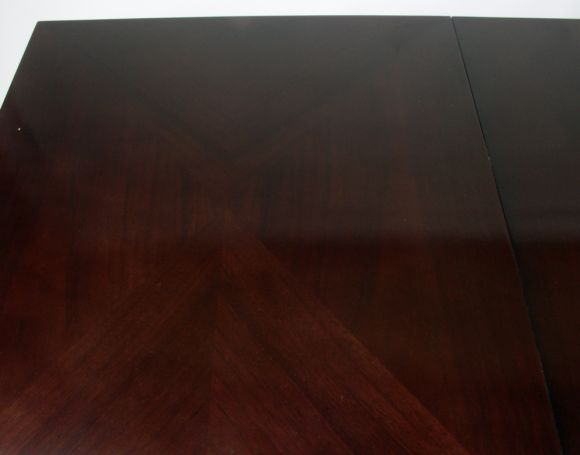Elegant 1950s dining table with chevron mahogany inlay on top