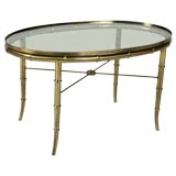 Brass faux bamboo oval cocktail table, made in Italy