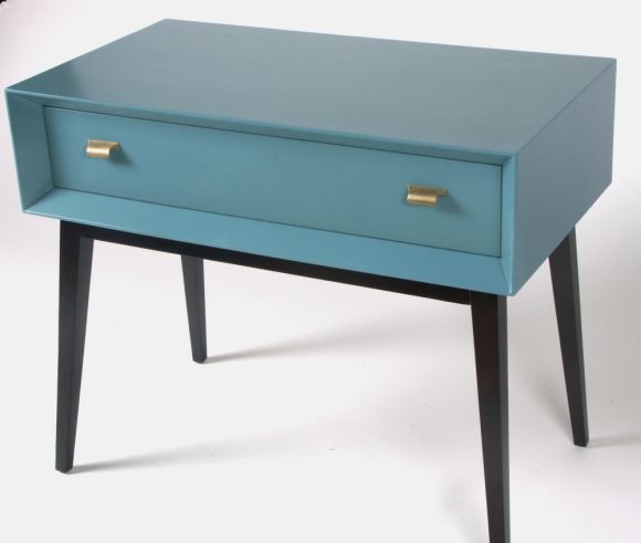 Blue lacquer console with tapered dark mahogany legs, brass pulls, frame around single drawer is beveled.
