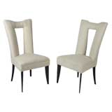 Pair of Paul Laszlo  High Back side chairs with cut out design