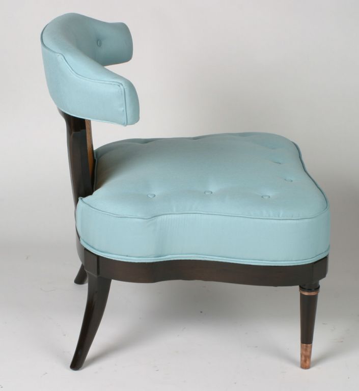 Pair of Robin's egg blue upholstered slipper chairs with serpentine seats and cane inset backs.