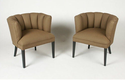 Pair of channel back occasional chairs in beige fabric with dark mahogany legs. Price for the pair.