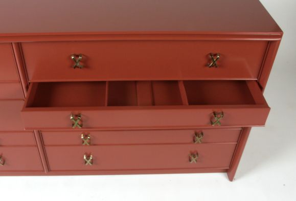 Paul Frankl for Johnson Furniture Company chest of 10 drawers. Lacquered in beautiful chinese red/ orange with brass X pulls.