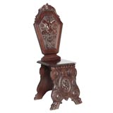 SET OF THREE HEAVILY CARVED FANTASY CHAIRS