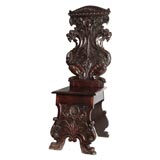 HEAVILY CARVED GRIFFIN CHAIR