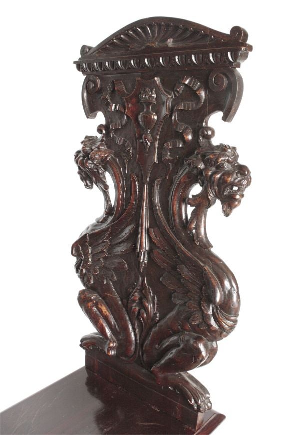HEAVILY CARVED GRIFFIN CHAIR at 1stDibs